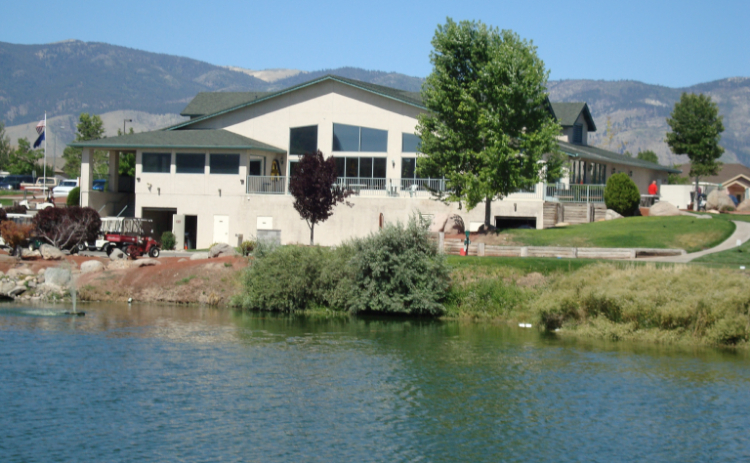 view of the clubhouse next to to creek